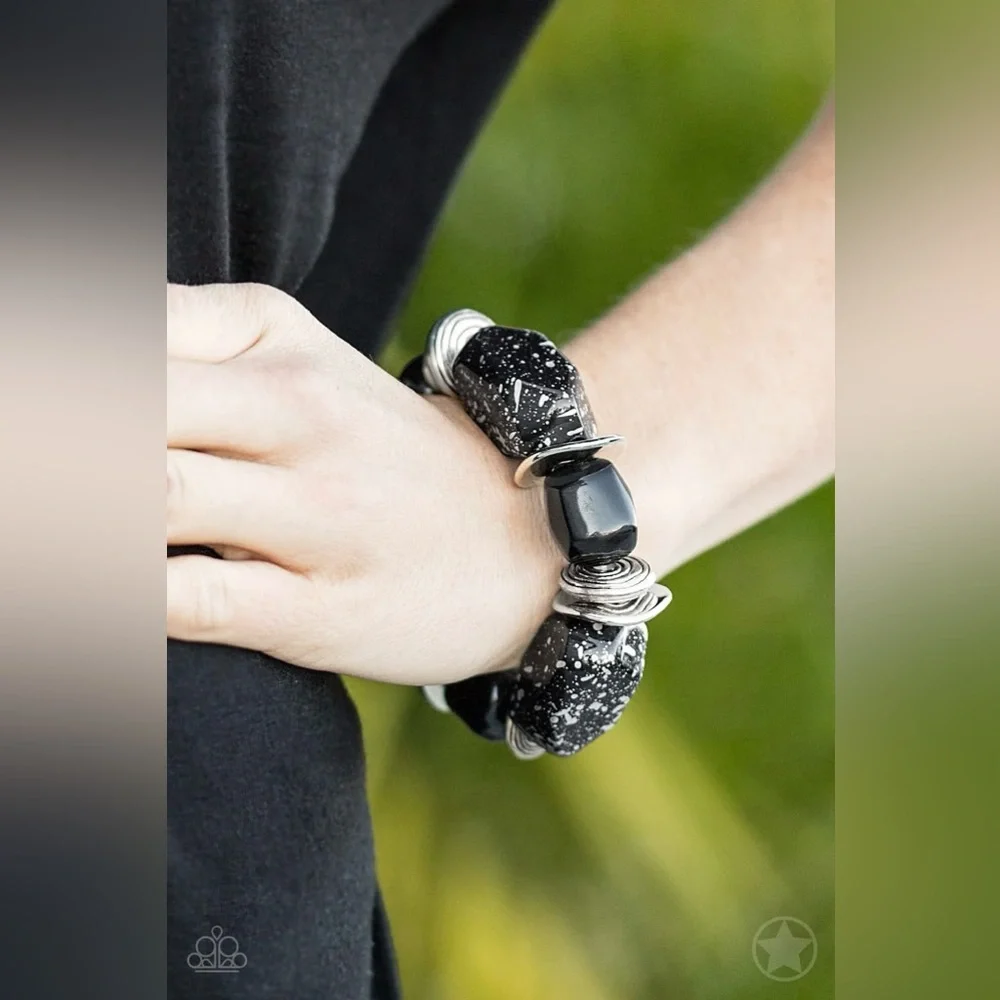 Black and Silver Wearable Tech Bracelet